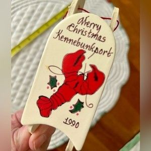 Vintage Kennebunkport Lobster on a Sled Christmas ornament dated 1990.